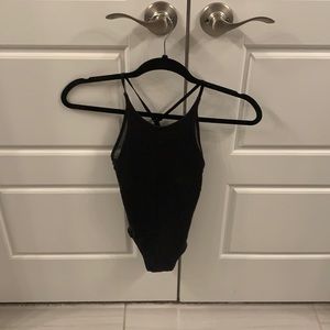 Super cute size 12 girls black leotard by Ivivva.